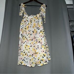 Grace and Emma beach romper with pockets and tie straps. Size large